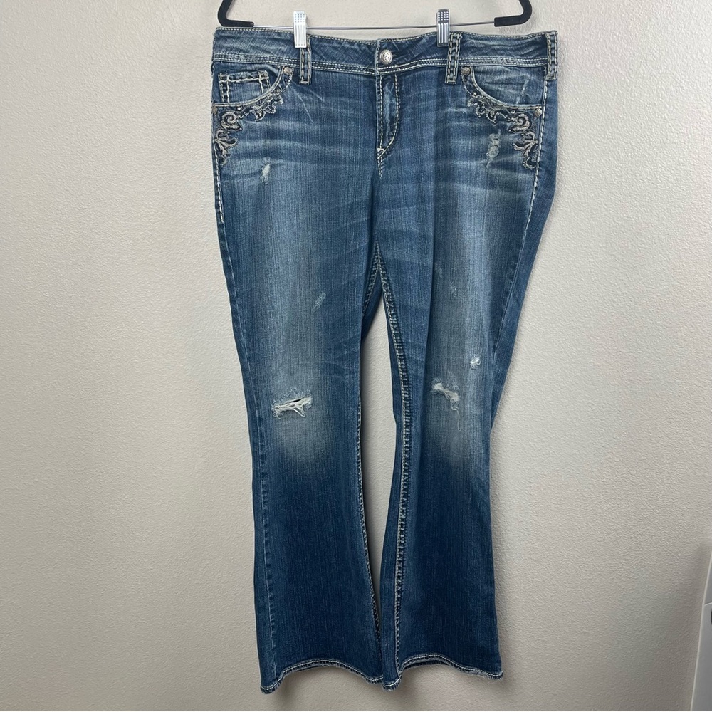 Silver Jeans Blue Boot Cut Denim with Distressed Details